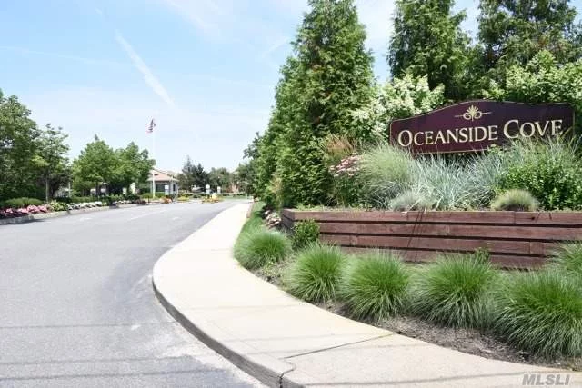 Beautifully Maintained 1st Floor Unit In The Phase 3 Part Of Oceanside Cove. This Unit Boosts A Huge Mbr With Full Bath, Numerous Closets, A Gorgeous View Of The Fountain And Pond Directly From The Lr And Is Conveniently Located Close To The Pool, Club House And Tennis Court. Move In Time To Enjoy The Fall Foliage That Surrounds Your From Your Private Deck!!