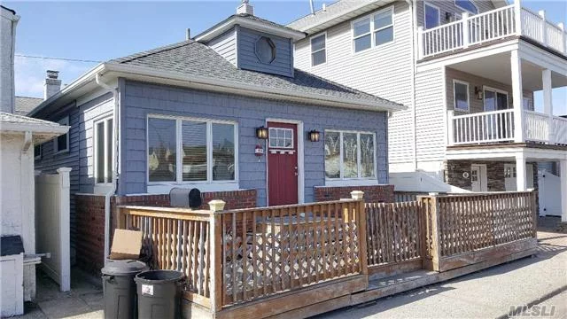 Location-Location-Location!! A Few Houses Up From Ocean/Beach/Beginning Of Boardwalk. Located In Trendy West-End Beach Community. Open Lr/Dr Concept W Vaulted Ceiling & Fire-Place. 2/3Bedrooms. New Kitchen/Bath/Roof/Updated Electric/Boiler/Siding. Freshly Painted. Move Right In And Enjoy The Beach!! Currently A 2 Bed, Seller Will Covert Back If Need Be. Flood $1565.