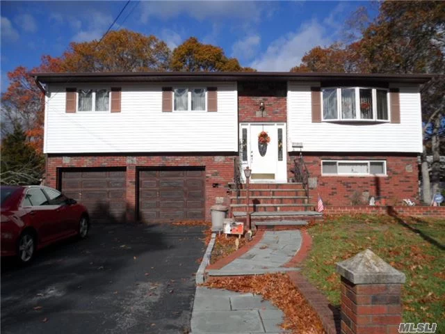 Nice Corner Property. 4 Bedroom Hi-Ranch. Needs Updating. 1 1/2 Bathrooms. Den W/Fpl And Sliders To Backyard. Wood Deck Off Eat-In-Kitchen. Formal Dining Room And Large Living Room. 2 Car Garage W/Electric Openers. Islip School District. House Sold As Is....