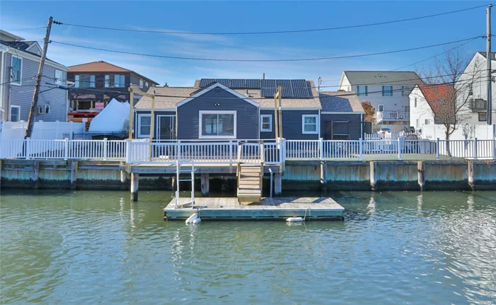 Move In Ready! Quietly Located In Lb&rsquo;s Secluded Canal Section, This Mint Waterfront Home Was Completely Renovated In 2013 And Perfectly Maintained! 80 Ft Of Improved Bulkhead And Floating Dock. Great For Outdoor Waterfront Entertaining. Ss Appliance, Granite Counters, Tile Floors W Radiant Heat. Solar Panels Owned. Roof 6Yrs Old. 2 Driveways.