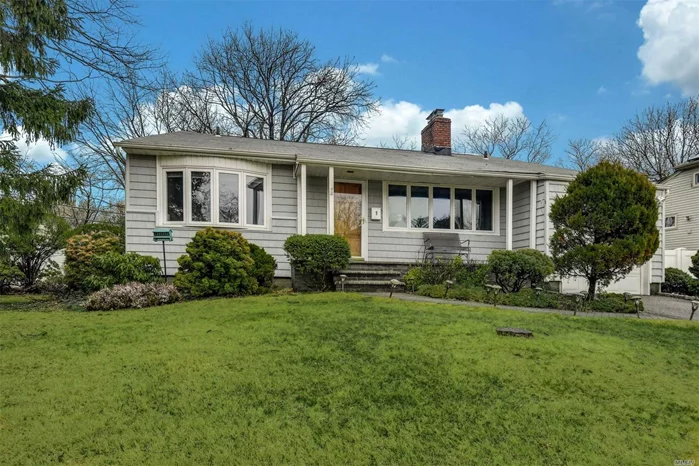 Sun-drenched South Facing 4 Bedroom, 2.5 Bath Front To Back Split. Hardwood Floors Throughout, Formal Living Room w/ Cathedral Ceilings and Wood-burning Fireplace. Oversized Den w/ Wood-burning Fireplace. Master En-Suite, CAC, In-Ground Sprinklers, 200 Amp Electric, Park Like Fully Fenced Yard