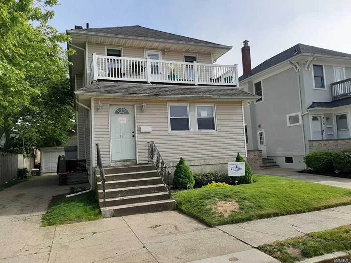 Beautiful & Well Kept, Bay Side Apt. Hw Flrs, Ss Appl, Large front Deck, Small pet Preferred. Shared Laundry in basement. Large finished pull-down attic