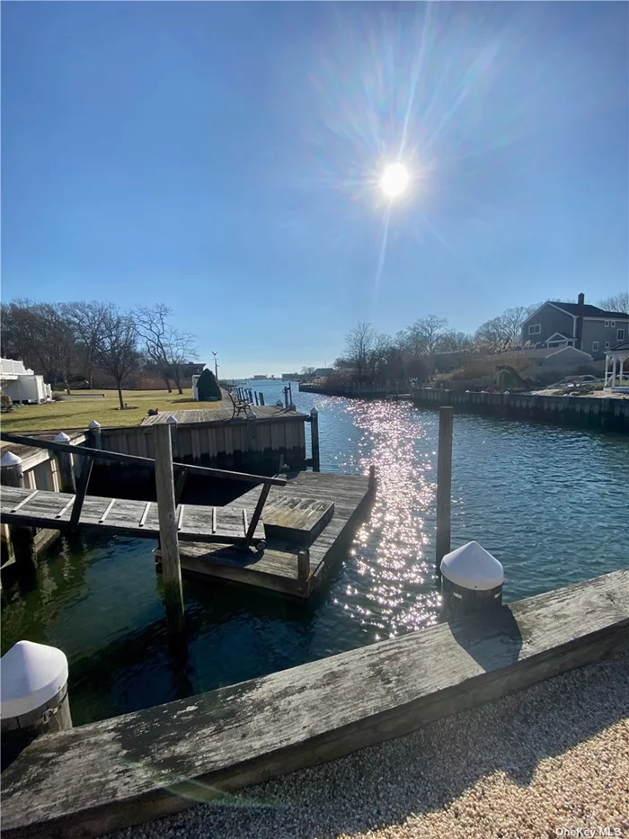 Waterfront Property on a spacious lot with easy access to Shinnecock Bay. Approximately 50&rsquo; of Bulkhead with floating dock. Immaculately kept 3 bedroom/2 bathroom ranch with &rsquo;vintage&rsquo; charm. True Main bedroom, full basement, oversized 2 car garage and plenty of extras.