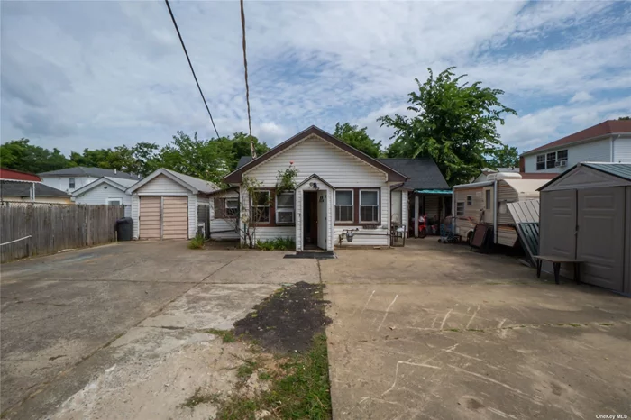 We offer you this property with endless possibilities! This neat and tidy ranch sits on an oversized, (60&rsquo; x 100), lot with R3-2 zoning. The existing house can be expanded, kept as a large single-family or converted into a 2-family, or a brand new 1- or 2-family home can be built - all options still leaving plenty of room for a large yard! Located in Fresh Meadows, in close & convenient proximity to mass transit, shopping, and schools. The existing house features 2 bedrooms, 1 bath, a new roof, a new sewer line, a detached 1-car garage, a full finished basement, and a gas heating system.