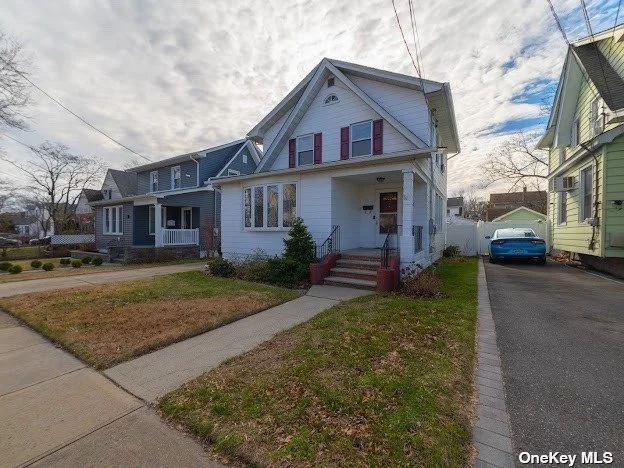 Spacious 3-bedroom colonial, original hardwood floors with outside entrance to basement. 200 amp electric. Big yard with patio space. great location seconds away from stores, schools, and transportation. E. Rockaway Schools